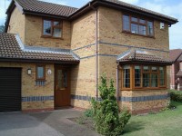 House showing brown UPVC replacement windows